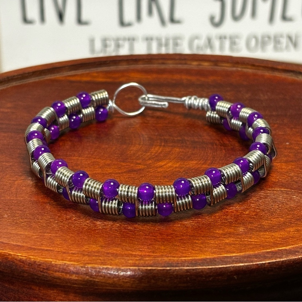 Artisan handmade coil wire wrapped beaded bracelet.